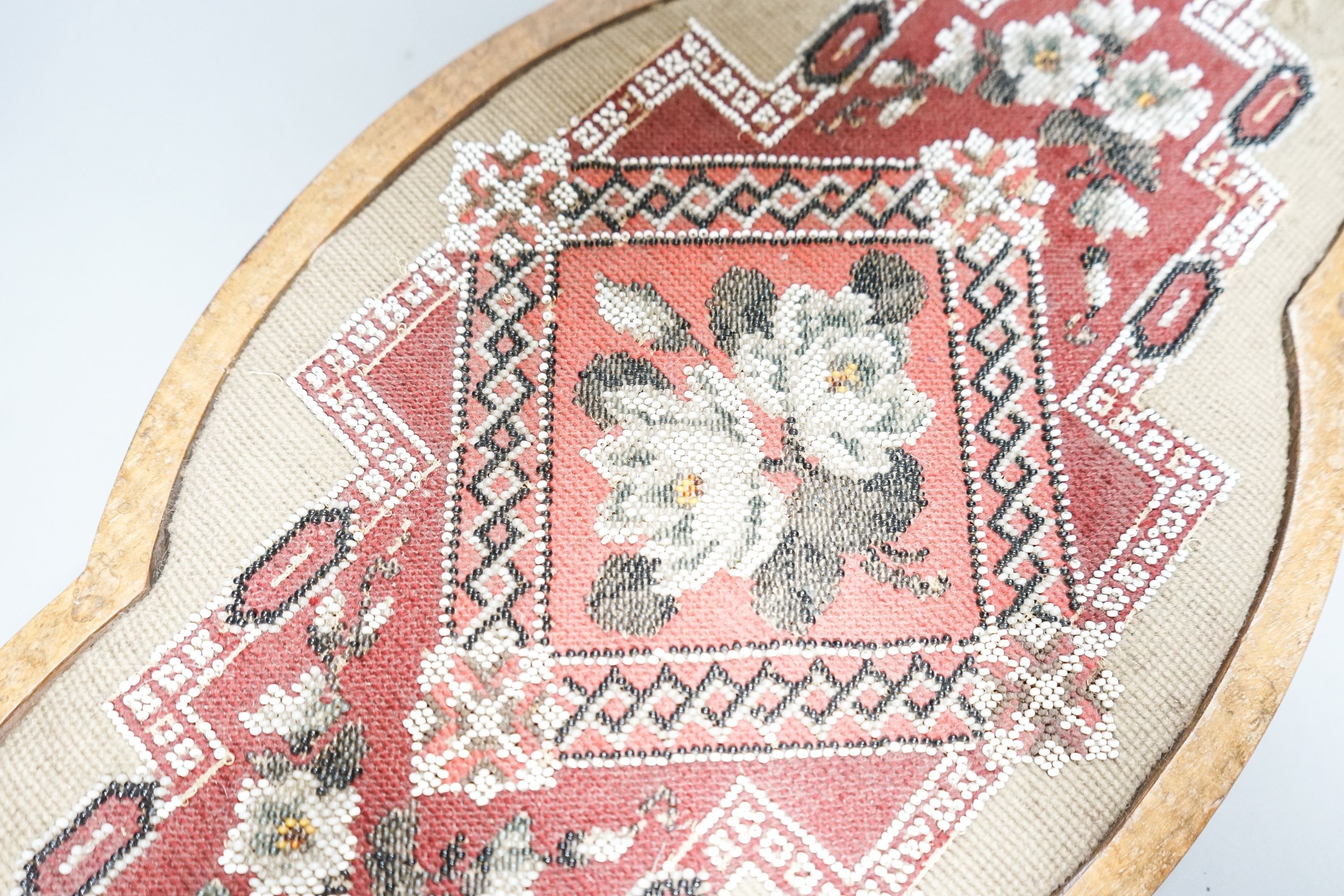 A Victorian beadwork centre plate / tray 55cm
